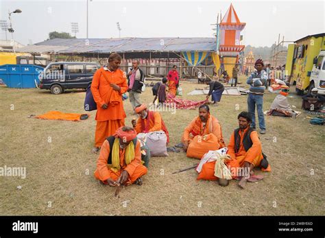 Sadhus And Pilgrims Preparing For Makar Sankranti Dip At Gangasagar