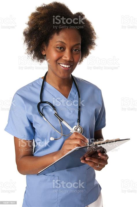 African American Nurse Charting Stock Photo Download Image Now