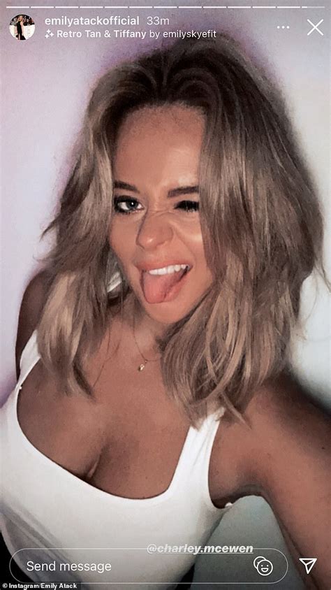 Emily Atack Puts On A Busty Display In Tiny White Vest Top As She