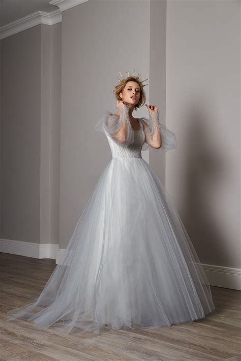 Her wedding gowns are known for their simple. Pin by Anjana P on Wedding dresses | Dresses, Wedding ...