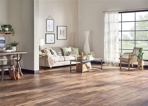 Aquaseal 24 laminate floors can occasionally be wet mopped, steam mopped and jet mopped. AquaSeal 72 12mm+pad Copper Ridge Chestnut - Family Room ...
