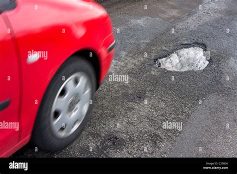 Pothole Road Winter Deep Driving Dangerous Damage Stock Photo Alamy