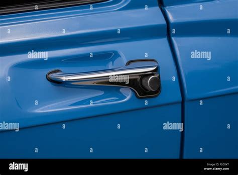 Old car handle, handle of blue retro automobile Stock Photo - Alamy