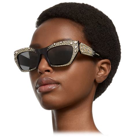 swarovski swarovski cat eye sunglasses black sunglasses swarovski eyewear avvenice