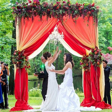 15 creative wedding canopies perfect for your big day brit co paper flower garlands floral