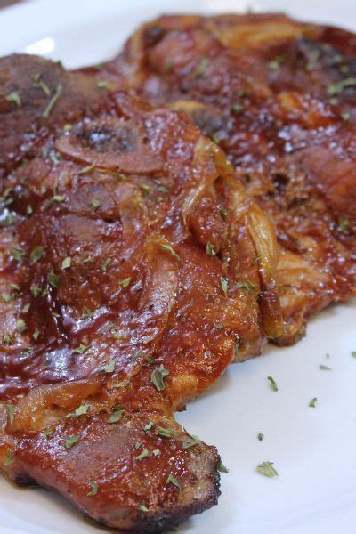 Place the pork in a shallow roasting pan and roast. Oven Baked Barbecue Pork Chops | I Heart Recipes | Recipe in 2020 | Pork steak recipe, Baked ...