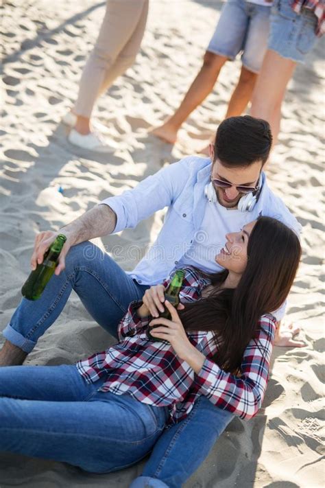Happy People Drinking And Having Fun At Beach Stock Photo Image Of