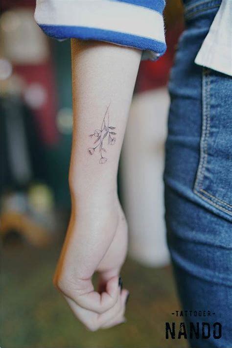 Fine Line Flower Tattoos On The Left Wrist