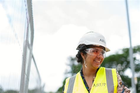 Photo Of Female Engineer Wearing Hard Hat And Yellow Vest · Free Stock