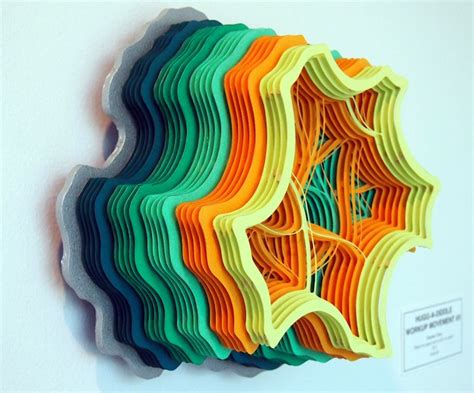 Thousands Of Paper Sheets Layered Into Colorful Formations
