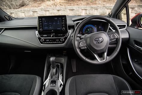 Advanced safety features and dashboard tech are highlighted. 2019 Toyota Corolla ZR Hybrid review (video ...