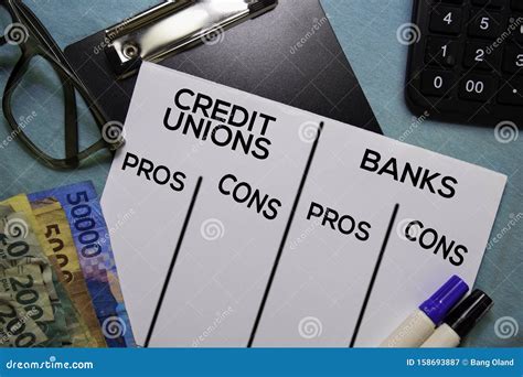 Credit Unions Vs Bank Text On Document Form Isolated On Office Desk