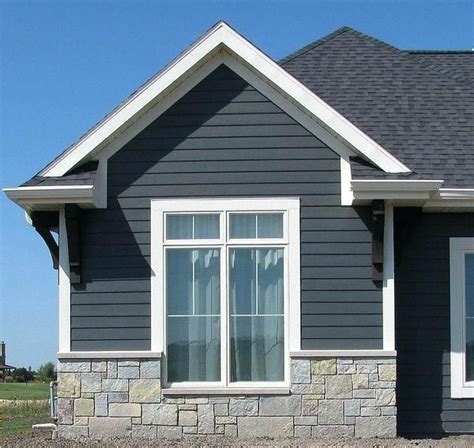 Did you know vinyl siding now includes the look of architecturally accurate natural stone? stone look vinyl siding buff gray castle rock siding ...