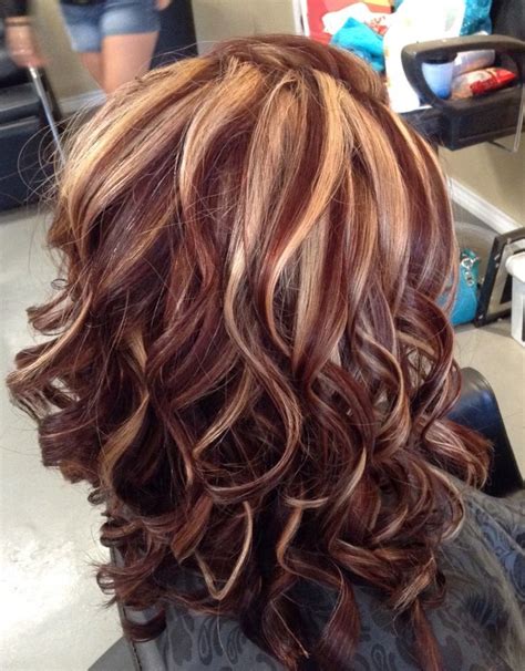auburn color with blonde highlights by melissa at mustang sally s salon in trinity tx hair