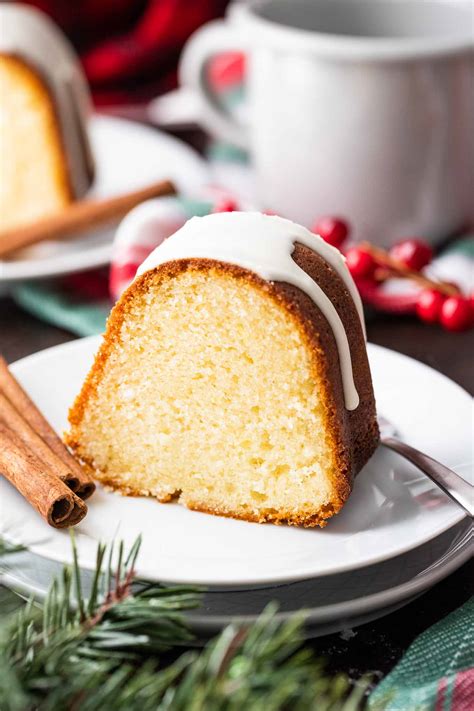 Rich and buttery, this eggnog pound cake flavored with rum, vanilla, cinnamon and nutmeg is like christmas in cake form. Eggnog Cake {Easy from scratch recipe!} | Plated Cravings