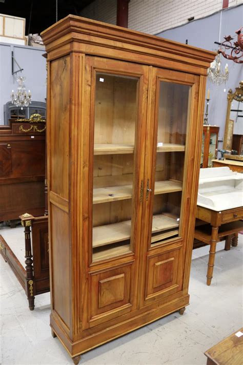 Basically, you attach the pivot hardware, join the two sides of the door with a piano hinge, stand the door up, put. Antique French walnut two door bookcase, approx 206cm H x 11