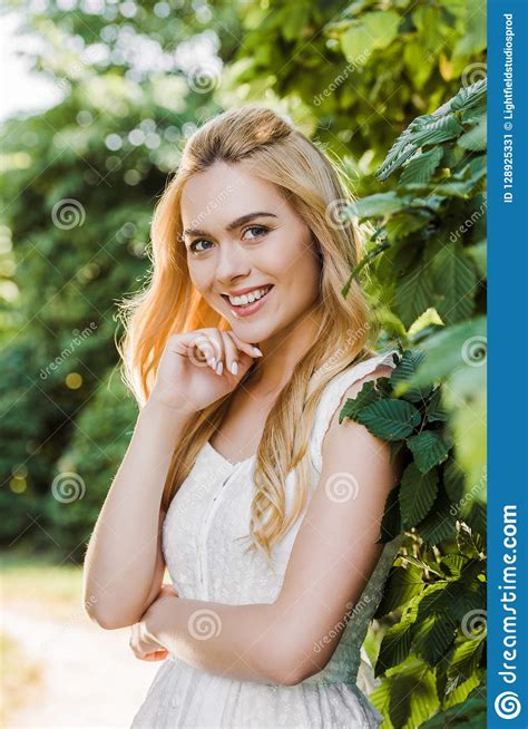 Beautiful Young Blonde Woman In White Dress Smiling Stock Image Image