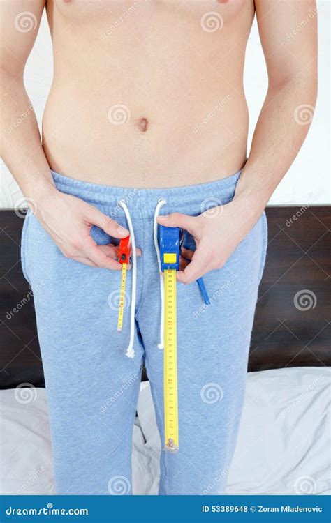 Man Hanging Or Holding In Hands Two Meters And Measuring Desire Stock Photo Image Of People