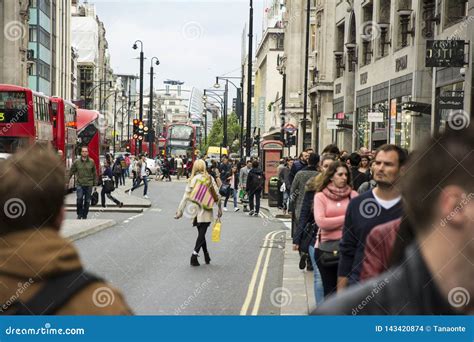London Uk April 5 2014 People Walking Down The Street In Crowded