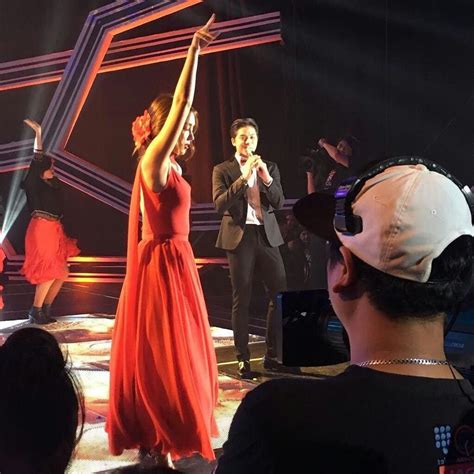 this is the handsome daniel padilla and the pretty kathryn bernardo performing a latin song