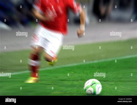 Motion Blur Of A Soccer Player In Action With A Ball Bern Canton Of