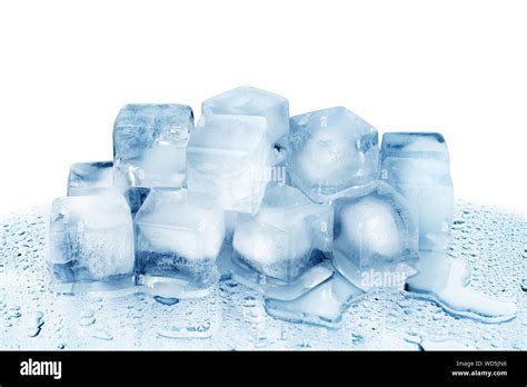 Ice Cubes On White Glass Mirror Background With Reflection Isolated