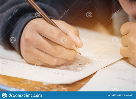 Students Hands Taking Exams Writing Examination Room With Holding