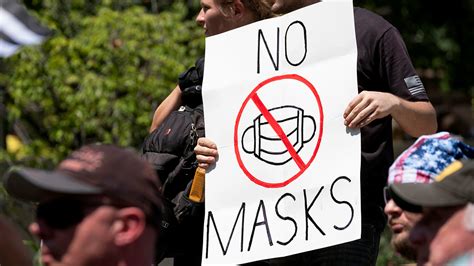 Republicans Democrats Differ On Why Masks Are A Downside Of Covid