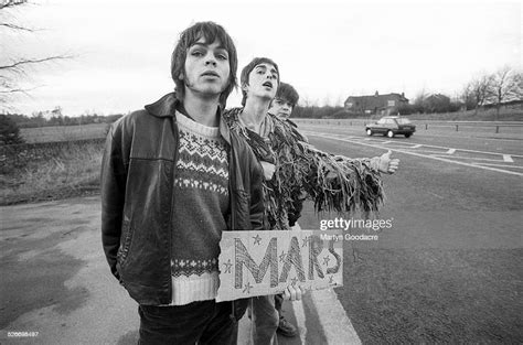 Group Portrait Of Supergrass Trying To Hitch A Lift To Mars By The