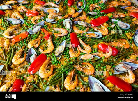 Ingredients Cooking In A Traditional Spanish Paella Recipe Paella Is A