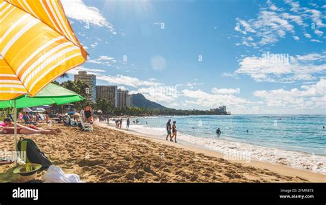 Oahu Hawaii People Enjoying Waikiki Beach With Diamond Head In