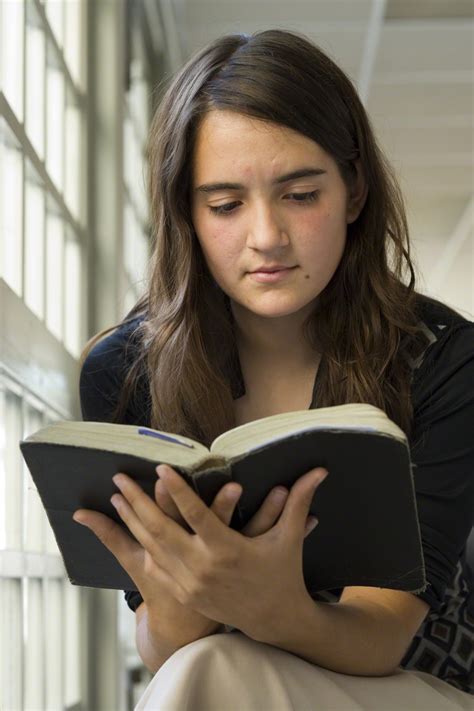 Young Woman Reading Scriptures