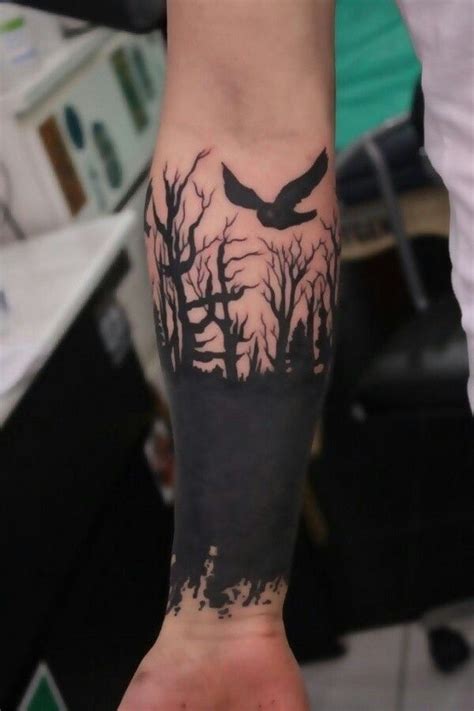 raven and dark wood forearm tattoo forearm word tattoo forearm cover up tattoos tribal forearm