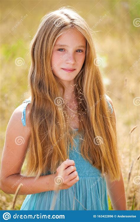 Portrait Of A Beautiful Young Blonde Little Girl Stock Photo Image Of