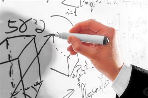 Man Writing Complex Math Formulas On Whiteboard Mathematics And