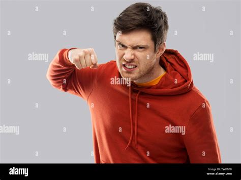 Angry Young Man Ready For Fist Punch Stock Photo Alamy