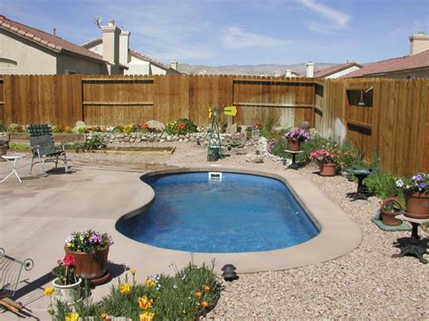 How big is a fiberglass swimming pool in florida? Aquamarine Pools | Viking Pools Kidney Model Swimming pool ...