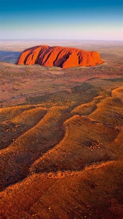 Uluru, also known as ayers rock and officially gazetted as uluru / ayers rock, is a large sandstone rock formation in the southern part of the northern territory in australia. Aerial view of Ayers Rock in Uluru-Kata Tjuta National ...