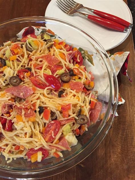 Cook spaghetti, rinse and place in a large bowl. Italian Spaghetti Salad Recipe - Lynn's Kitchen Adventures