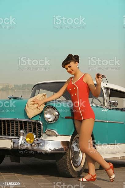 Beautiful Pinup Girl In Front Of The Vintage Car Stock Photo Download