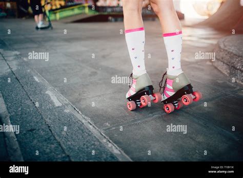 A Picture Of Girls Legs In Rollers She Is Skating On The Road Also