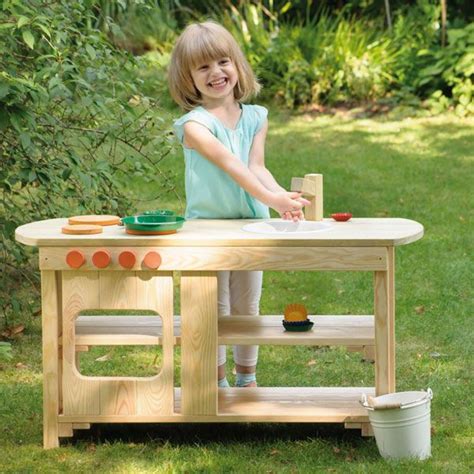 Strong and sturdy, our toy kitchens are made from top quality, responsibly sourced wood and can be paired with a variety of accessories from our play food range. Play Kitchen (Erzi) | Outdoor play kitchen, Play kitchen ...