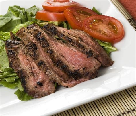 Remove steak from sauce, reserving sauce mixture. Grilled flank steak au jus | Bayway Catering