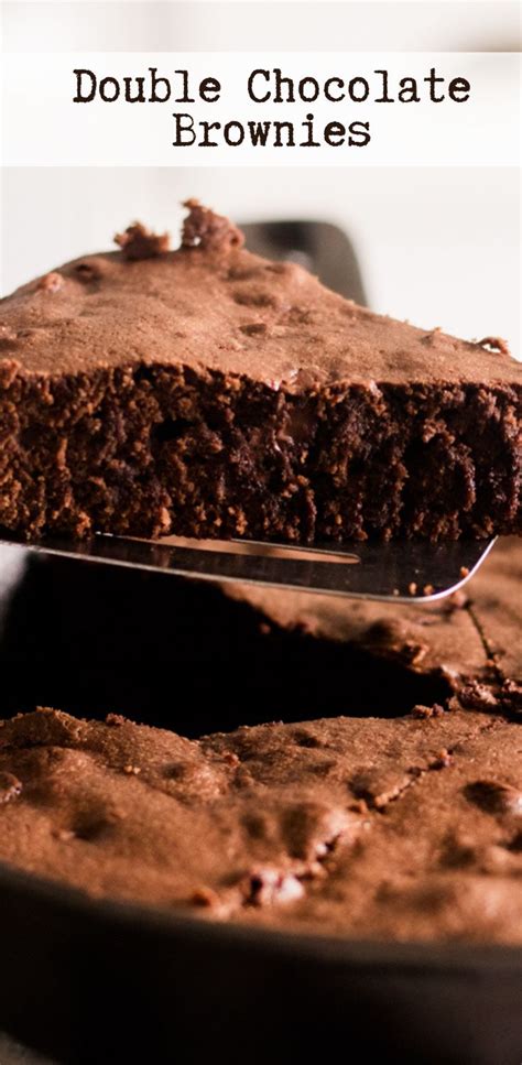 Double Chocolate Brownies On A Cake Pan With A Spatula In The Foreground