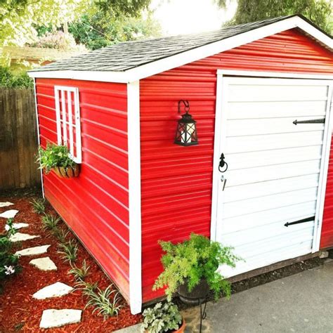Metal Garden Shed With Red Painted Walls And White Door Shed Decor