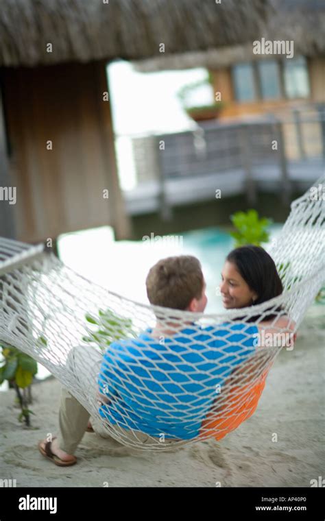 Couple On Hammock Bora Bora Nui Resort And Spa Bora Bora Island