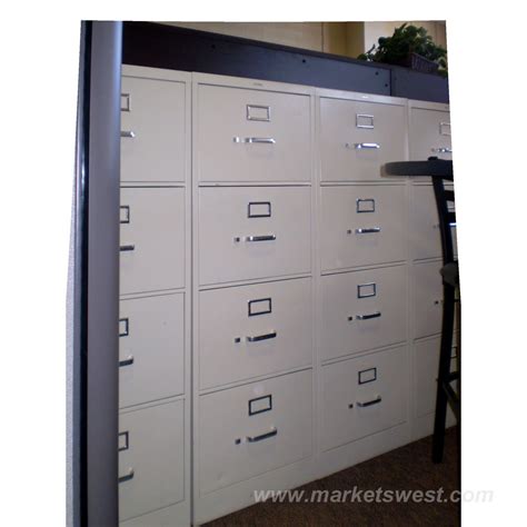 Safety interlock system allows only one drawer to open at a time. 4-Drawer HON Vertical Legal Size File Cabinets - Used