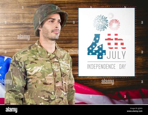 Proud Soldier Standing On American Flag Background Stock Photo Alamy