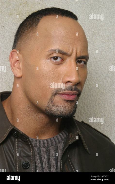 The Rock Dwayne Johnson Photographed With A 2 X 4 A Prop He Uses In