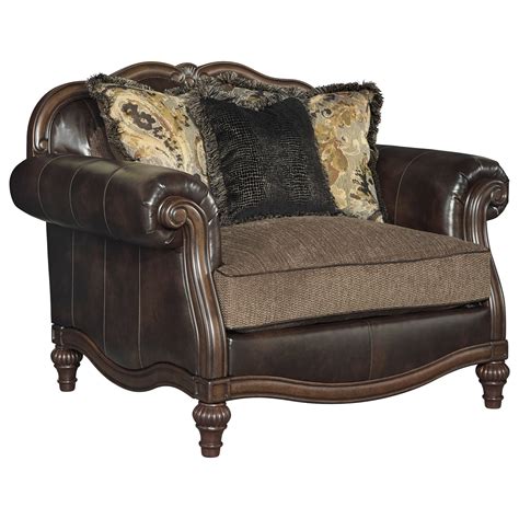 Take it easy in this spacious and comfortable chair and a half set with a rectangular ottoman. Signature Design by Ashley Winnsboro DuraBlend Traditional ...